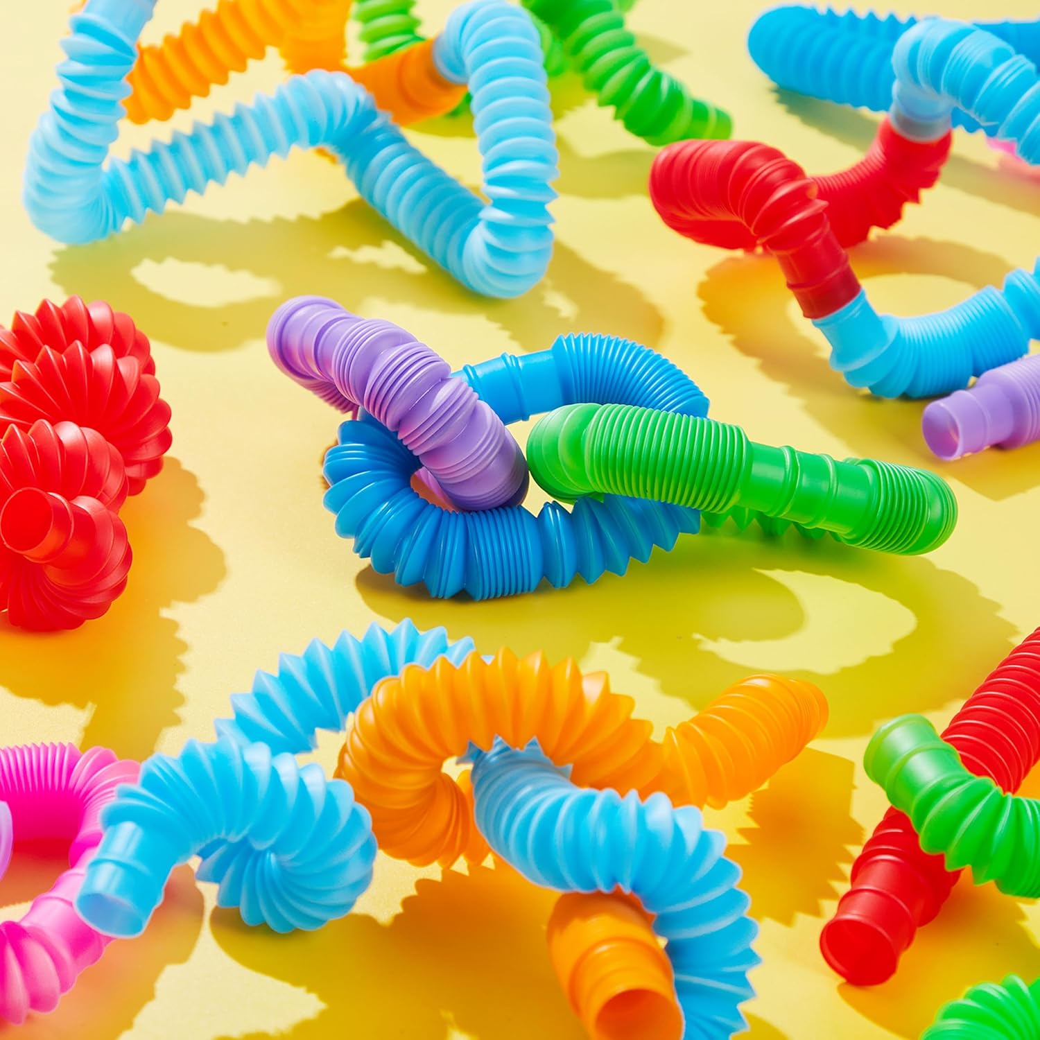 JOYIN 18 Pack Pop Tubes, Sensory Toys (Small) Fidget Toys Party Favors - 9 Colors, Creativity Learning & Fun for Kids - Perfect for Prizes Goodie Bags, Classroom School Reward - Image 8